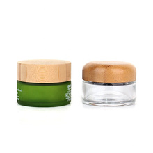 wholesale cosmetic packaging 50ml clear glass cosmetic bottle jars with bamboo lid